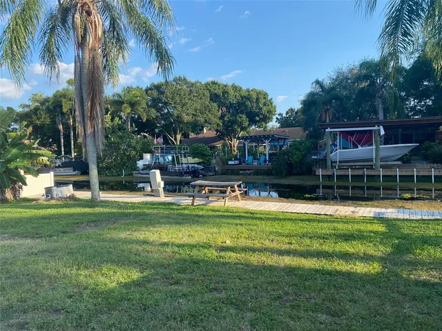 a lake view with a sitting space