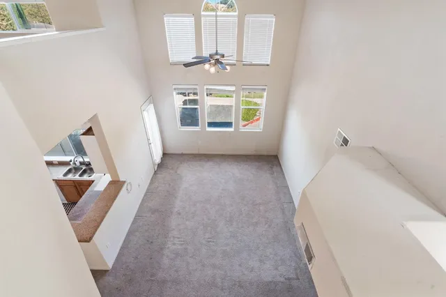 wooden floor in a livingroom with a window