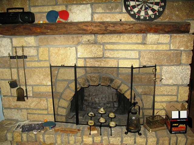 4514 Oneida Street Duluth, MN 55804 - Photo 14 of 17 Wood burning fireplace in the game room