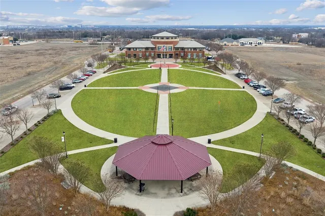 an aerial view of a house with a garden