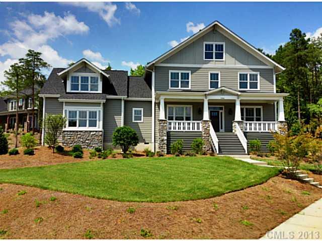 1008 Perriwinkle Lane Fort Mill, SC 29708 - Photo 1 of 16 a front view of a house with a yard