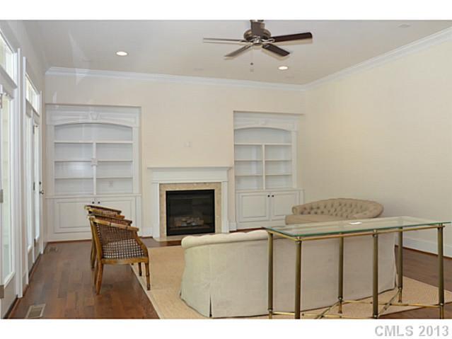 1008 Perriwinkle Lane Fort Mill, SC 29708 - Photo 4 of 16 a living room with furniture and a fireplace