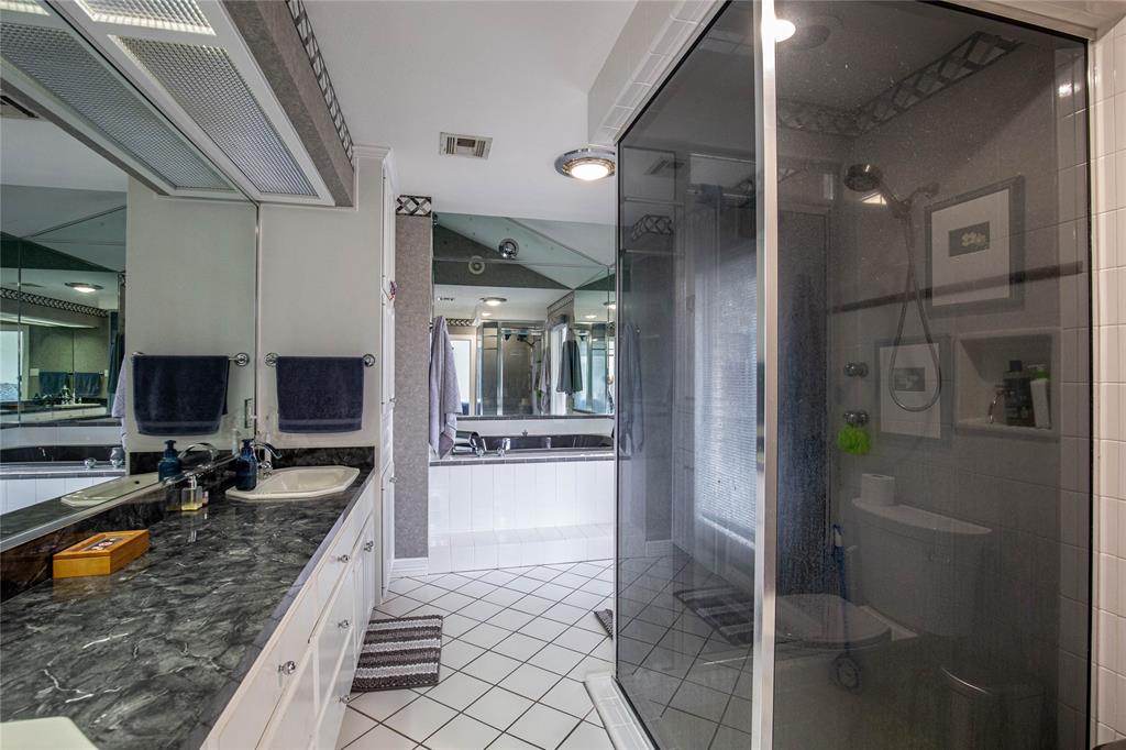 735 Willow Grove Road Woodway, TX 76712 - Photo 15 of 39 a large kitchen with a counter space a sink and a refrigerator