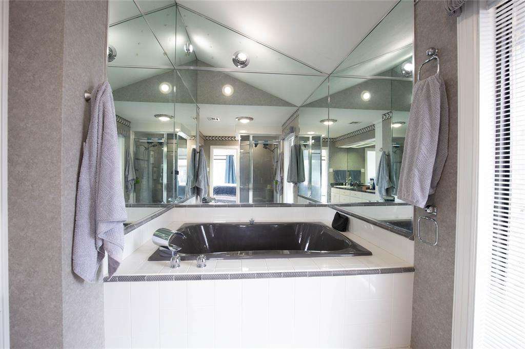 735 Willow Grove Road Woodway, TX 76712 - Photo 17 of 39 a view of a kitchen with a sink and chandelier