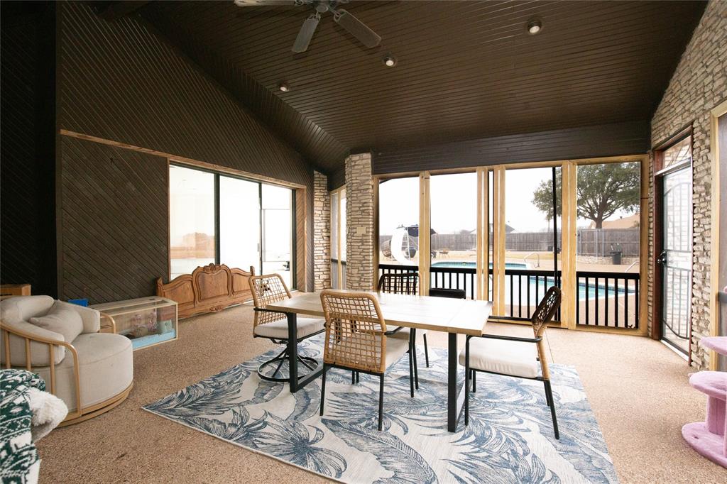 735 Willow Grove Road Woodway, TX 76712 - Photo 29 of 39 a living room with furniture and a large window