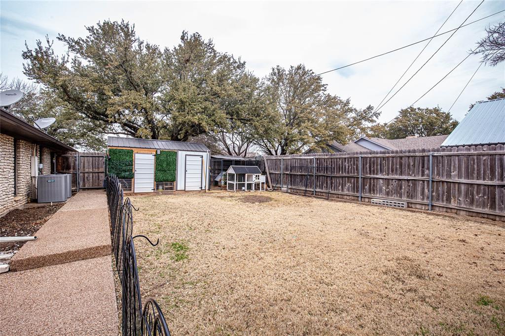 735 Willow Grove Road Woodway, TX 76712 - Photo 35 of 39 a view of a house with backyard and a tree