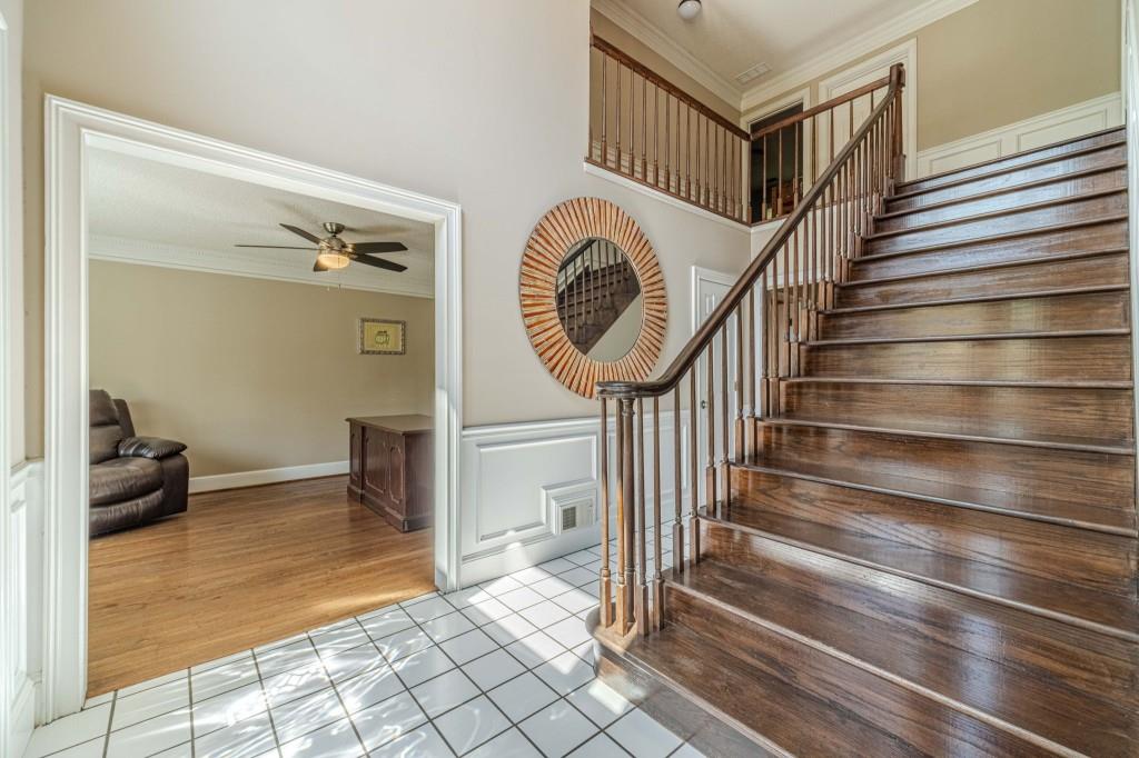 816 McDaniel Street Monroe, GA 30655 - Photo 26 of 52 a view of entryway and hall with wooden floor
