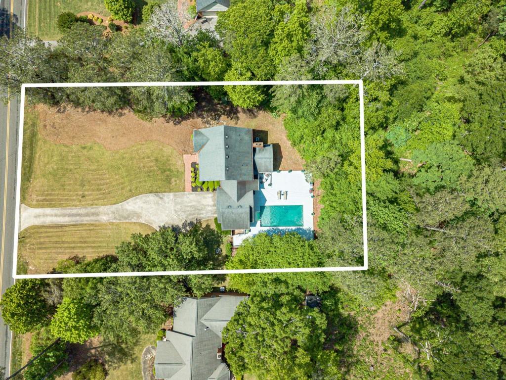 816 McDaniel Street Monroe, GA 30655 - Photo 3 of 52 an aerial view of houses with outdoor space