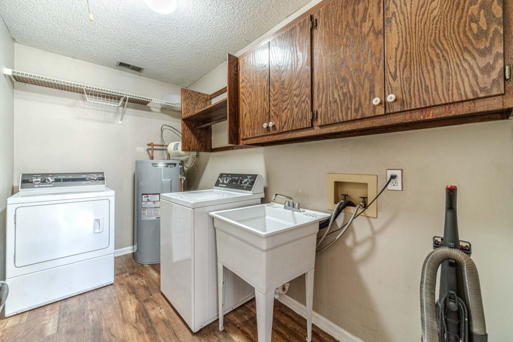 816 McDaniel Street Monroe, GA 30655 - Photo 39 of 52 a utility room with dryer and washer