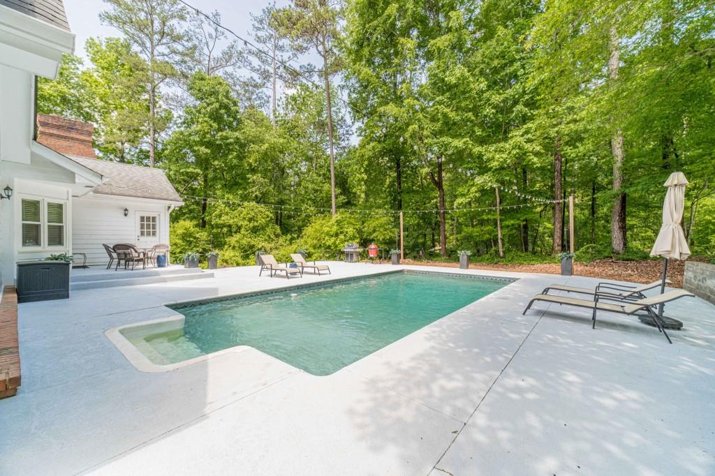 816 McDaniel Street Monroe, GA 30655 - Photo 44 of 52 a view of swimming pool with a patio