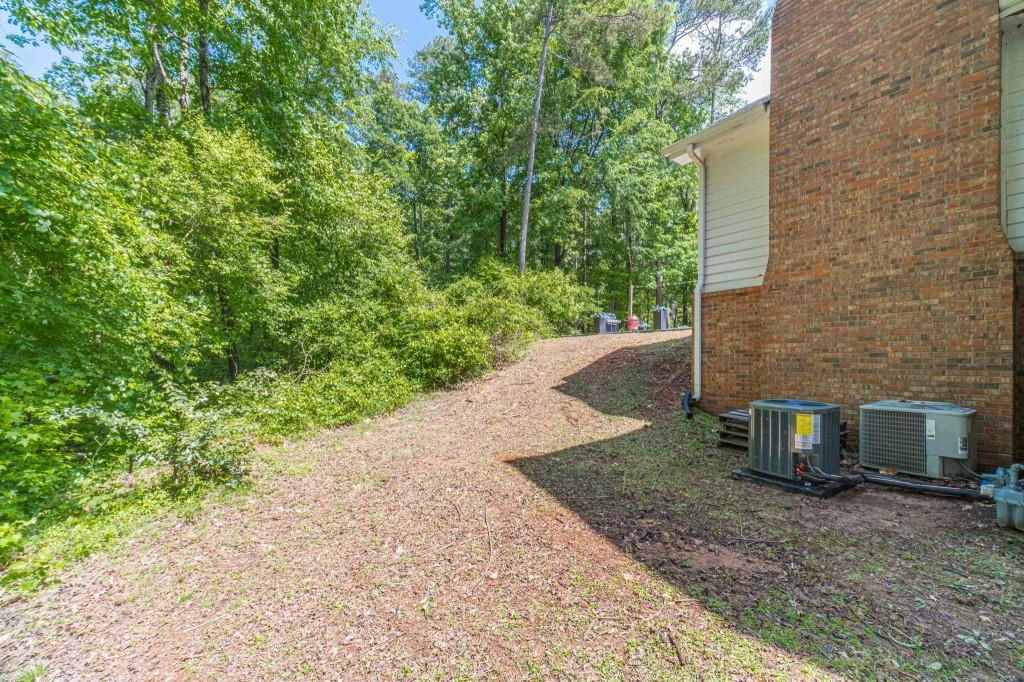816 McDaniel Street Monroe, GA 30655 - Photo 49 of 52 a view of a back yard of the house
