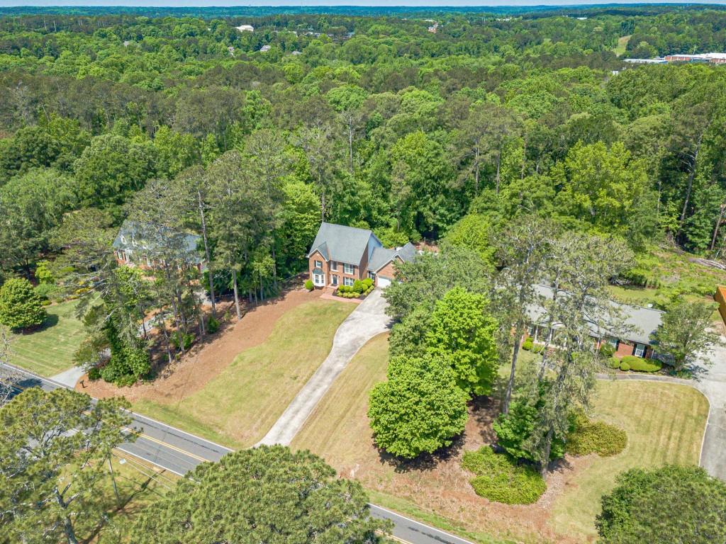 816 McDaniel Street Monroe, GA 30655 - Photo 50 of 52 a view of a yard with plants
