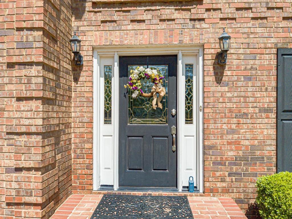 816 McDaniel Street Monroe, GA 30655 - Photo 5 of 52 a view of a wooden door