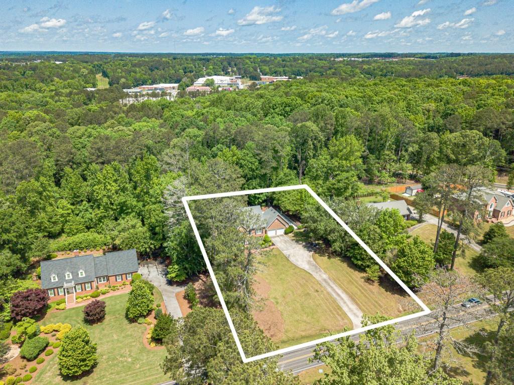816 McDaniel Street Monroe, GA 30655 - Photo 51 of 52 a view of a backyard