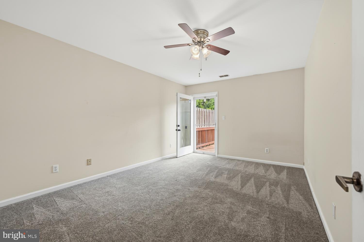 2627 Compass Drive Annapolis, MD 21401 - Photo 27 of 37 a view of an empty room with a window