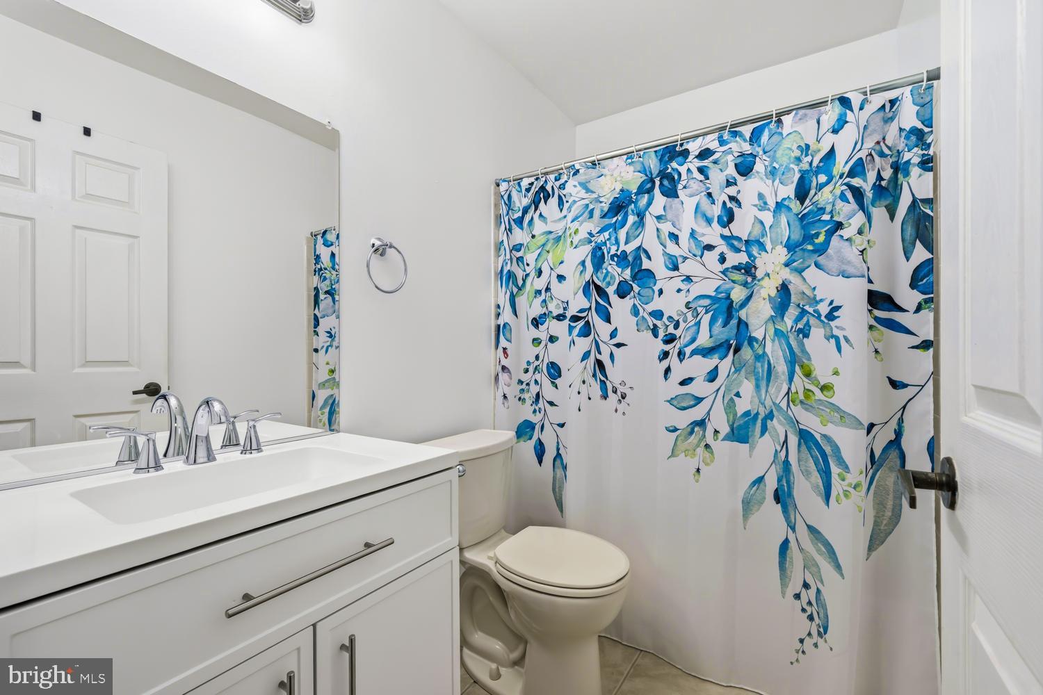 2627 Compass Drive Annapolis, MD 21401 - Photo 30 of 37 a bathroom with a sink toilet and a mirror
