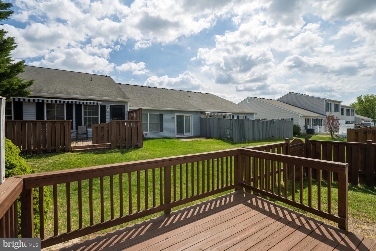 2627 Compass Drive Annapolis, MD 21401 - Photo 35 of 37 a view of a house with a wooden deck