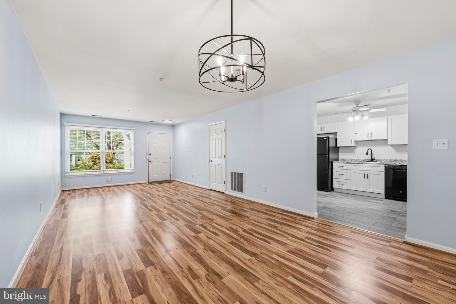 2627 Compass Drive Annapolis, MD 21401 - Photo 7 of 37 a view of a room with wooden floor and window