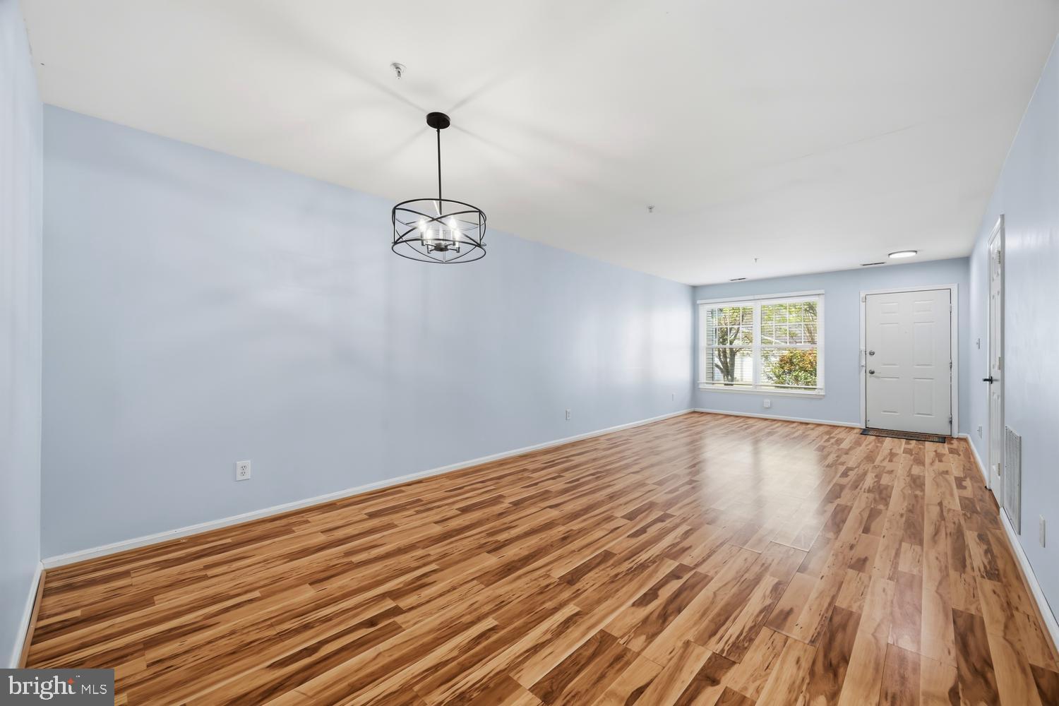 2627 Compass Drive Annapolis, MD 21401 - Photo 9 of 37 a view of empty room with wooden floor and fan