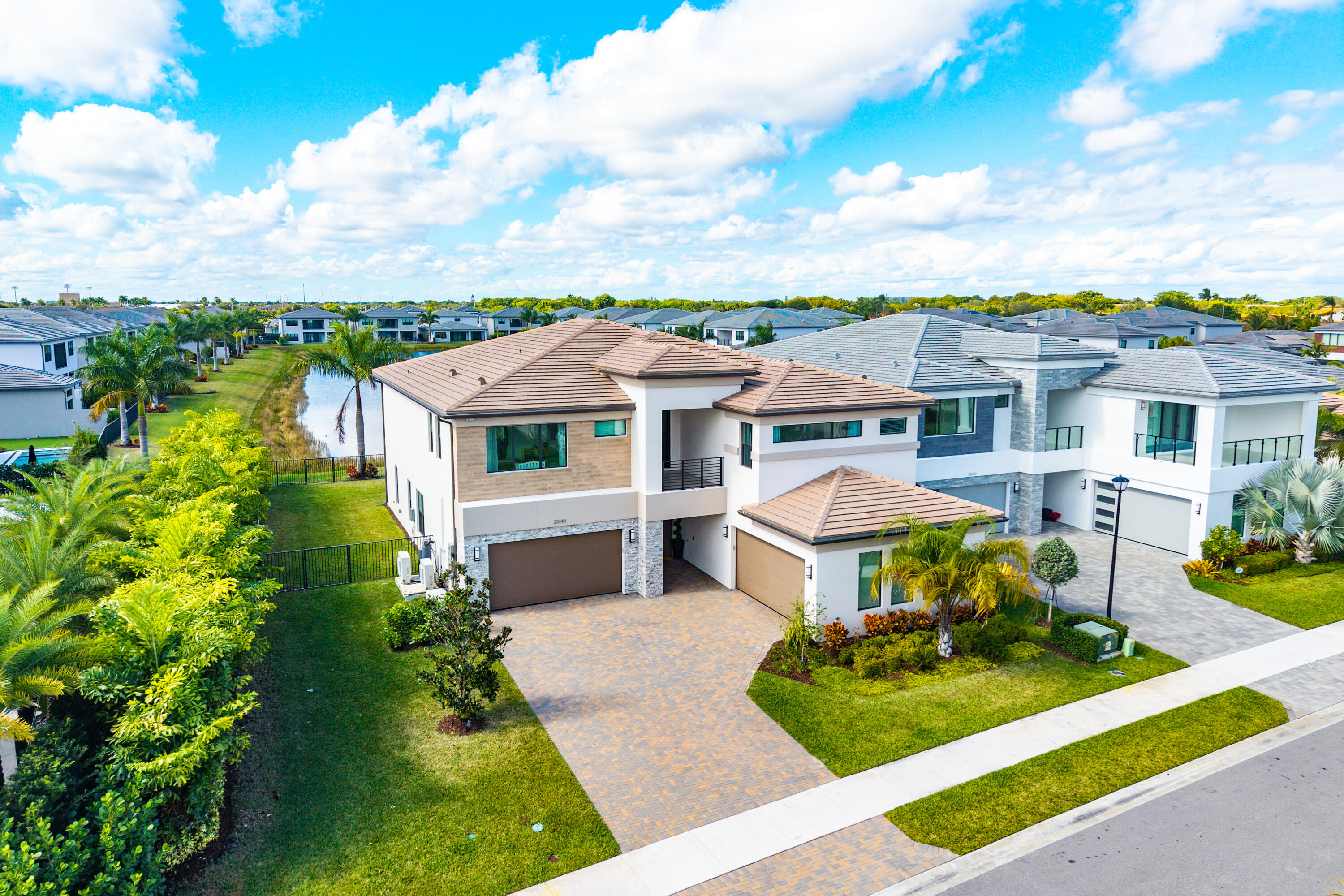 20145 Castle Stuart Avenue Boca Raton, FL 33434 - Photo 1 of 95 a aerial view of a house with swimming pool and furniture