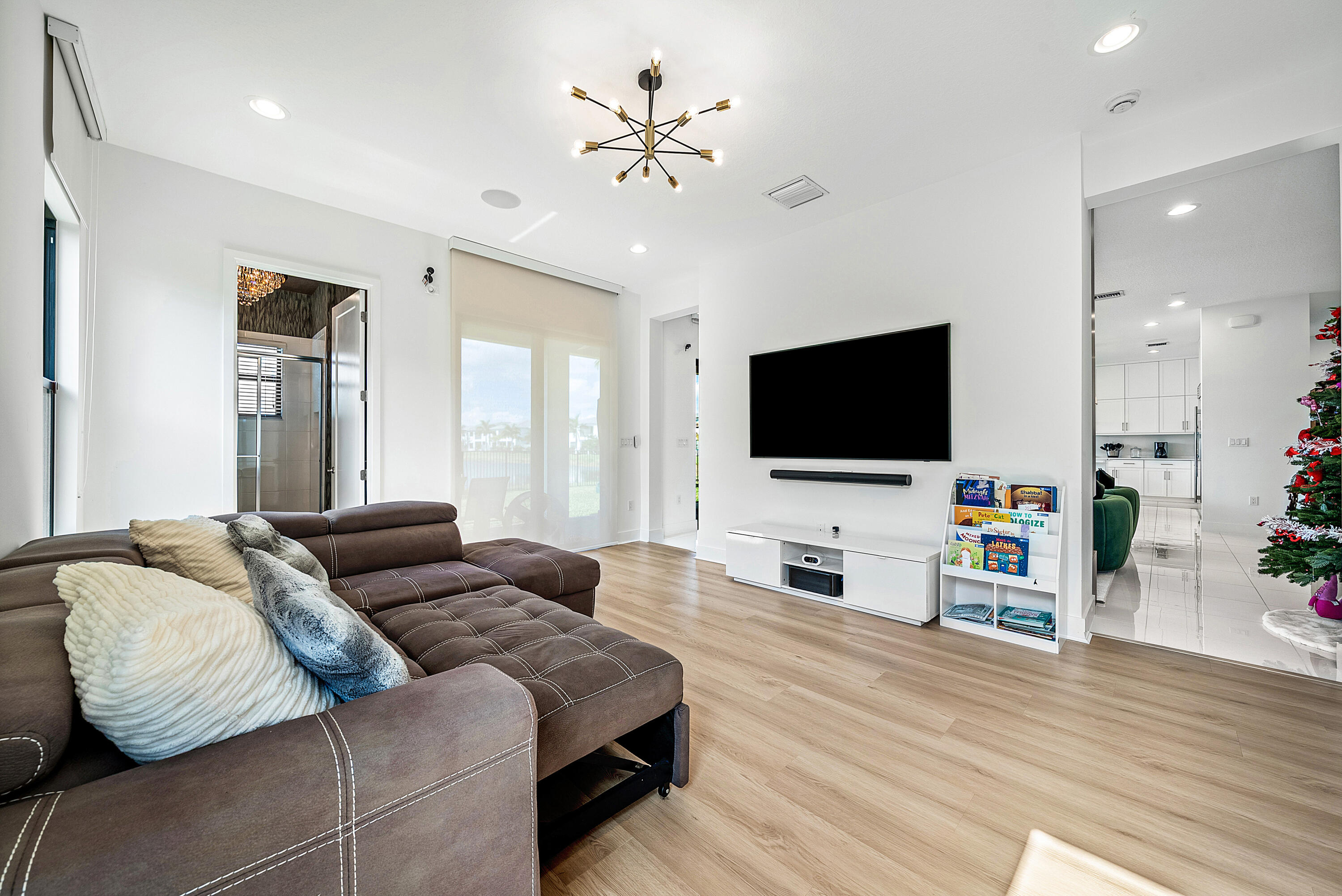 20145 Castle Stuart Avenue Boca Raton, FL 33434 - Photo 16 of 95 a bedroom with a bed and a flat screen tv