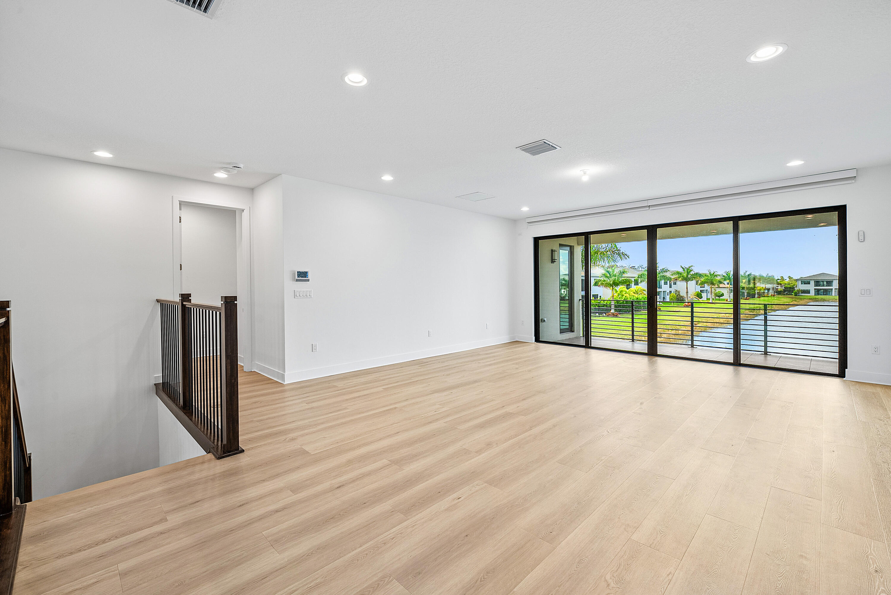 20145 Castle Stuart Avenue Boca Raton, FL 33434 - Photo 21 of 95 a view of an empty room with a window