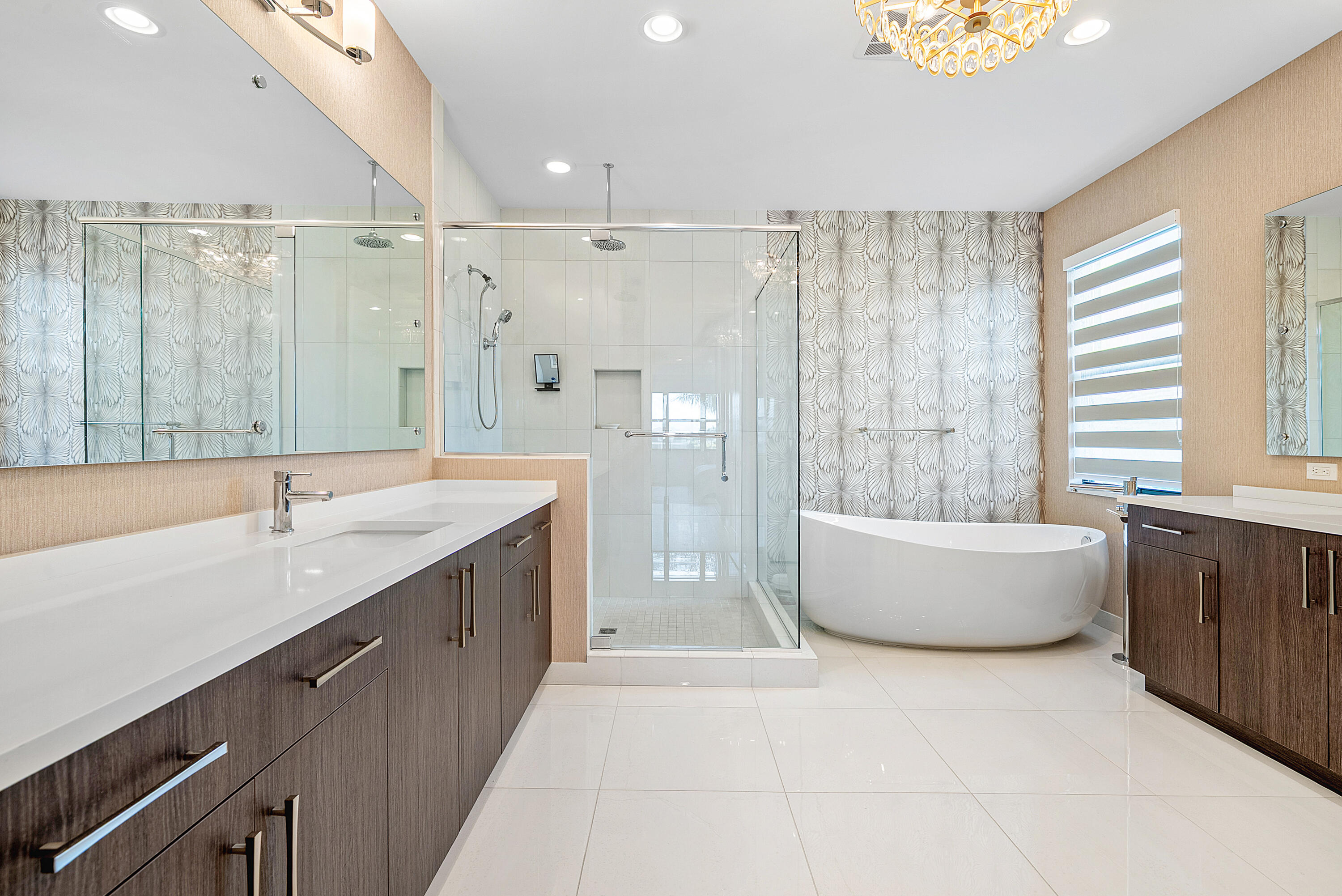 20145 Castle Stuart Avenue Boca Raton, FL 33434 - Photo 26 of 95 a spacious bathroom with a large tub shower and sink