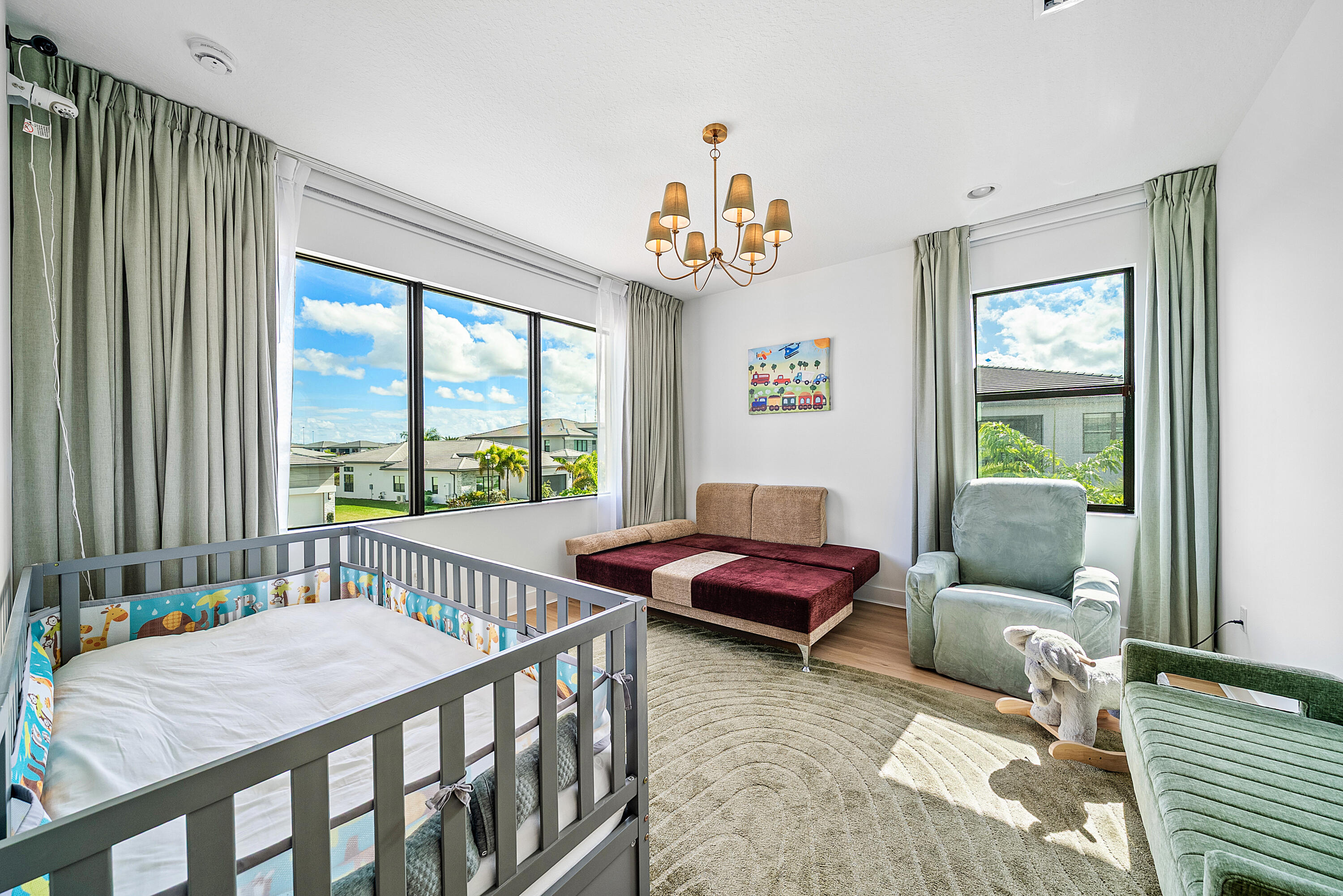 20145 Castle Stuart Avenue Boca Raton, FL 33434 - Photo 34 of 95 a bedroom with furniture and a window