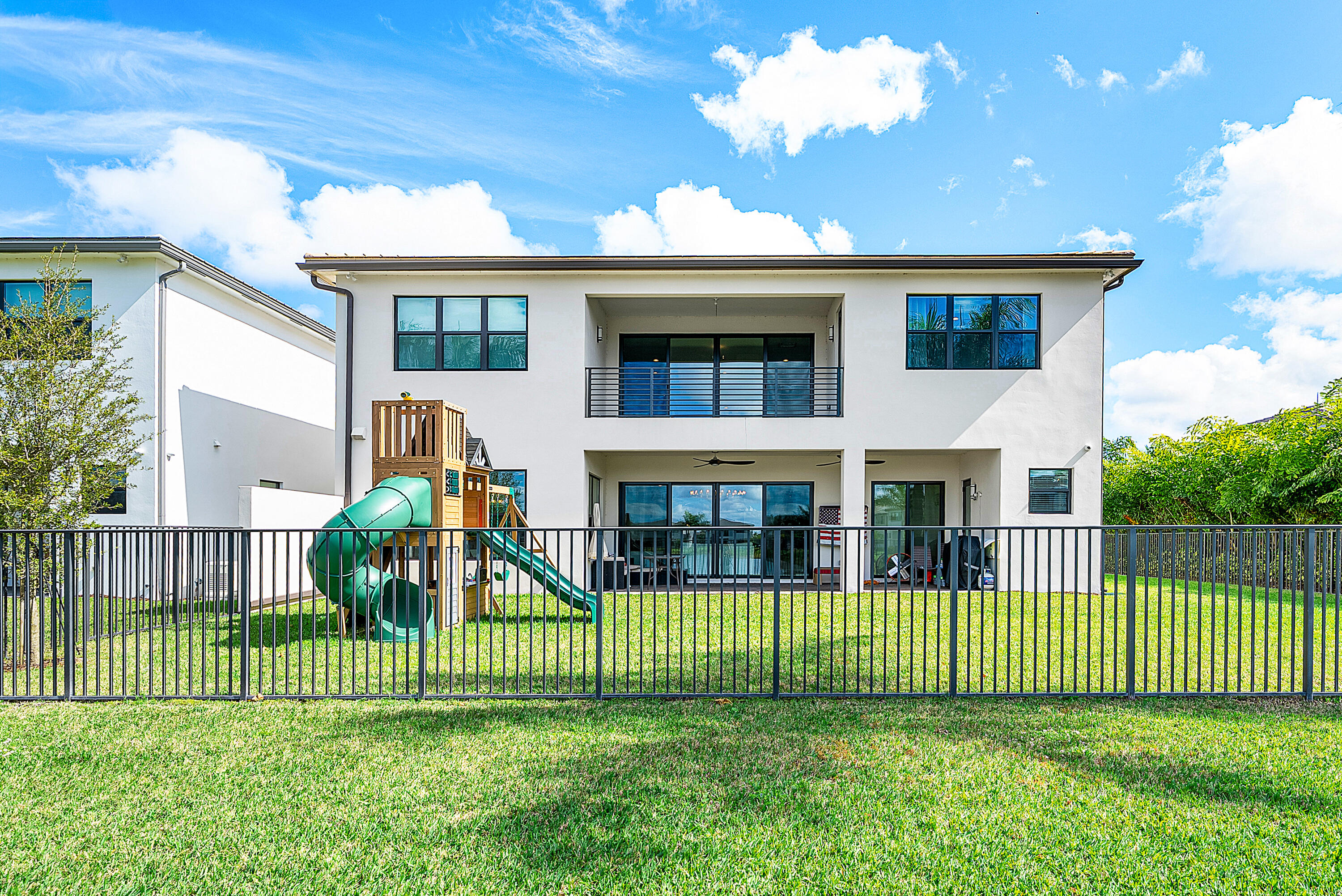20145 Castle Stuart Avenue Boca Raton, FL 33434 - Photo 38 of 95 a view of a house in a back yard