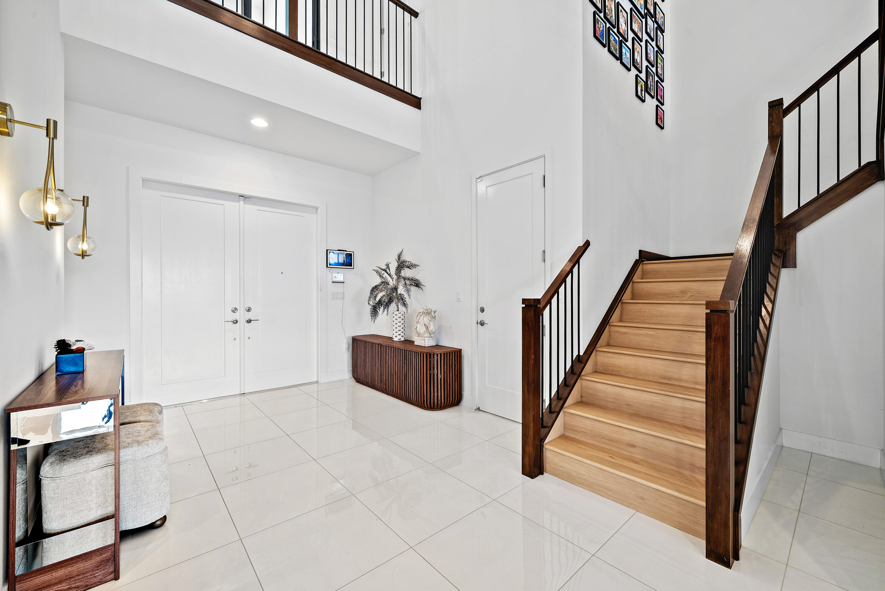 20145 Castle Stuart Avenue Boca Raton, FL 33434 - Photo 4 of 95 a view of an entryway with stairs
