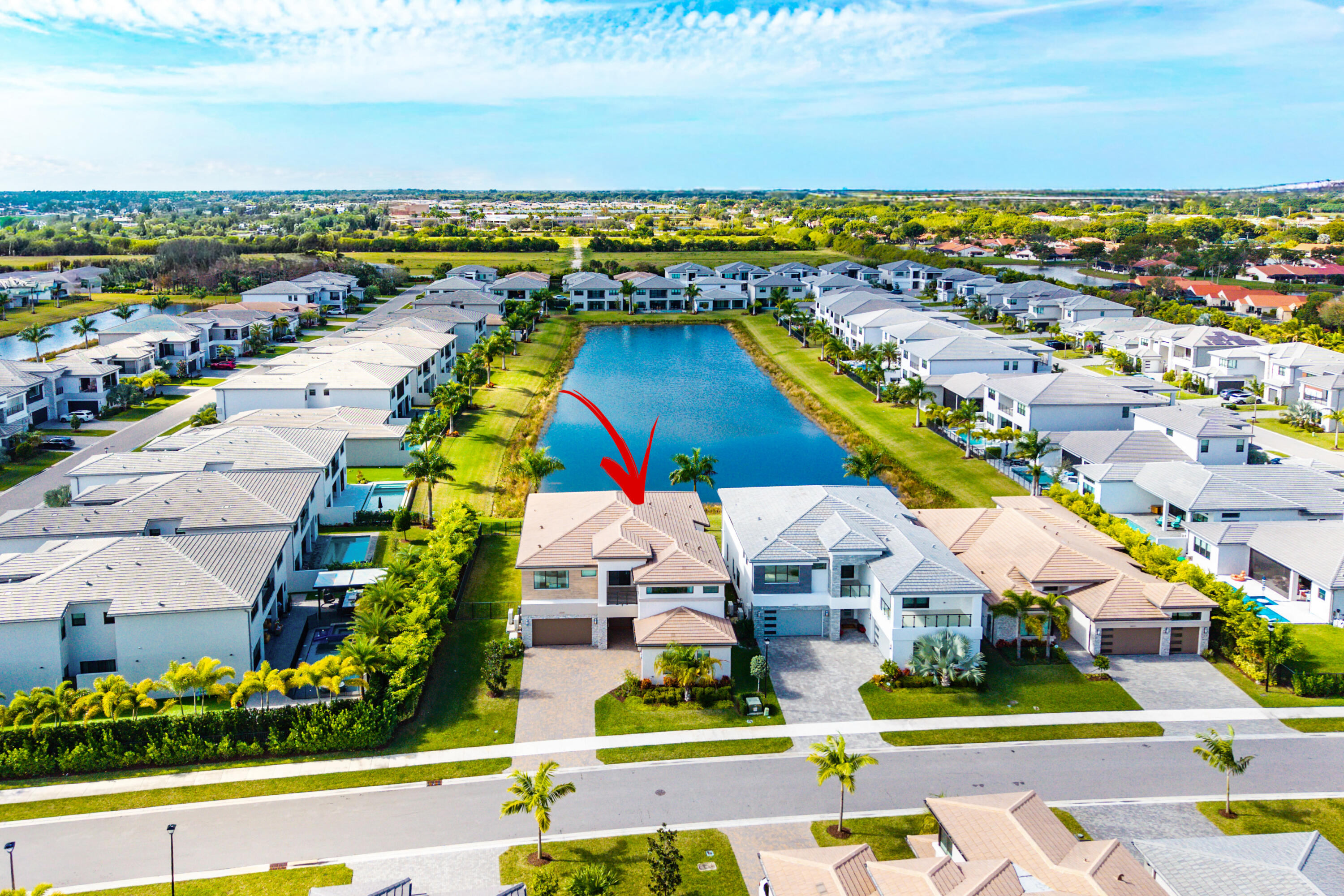 20145 Castle Stuart Avenue Boca Raton, FL 33434 - Photo 41 of 95 a view of swimming pool with outdoor seating and ocean view
