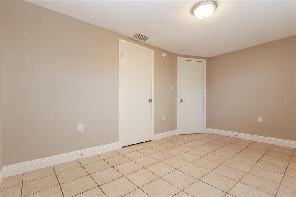 9226 Rainbow Lane Port Richey, FL 34668 - Photo 13 of 16 a view of an empty room