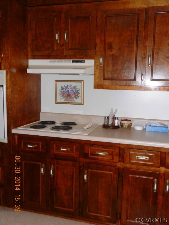 10940 Weybridge Road Chester, VA 23831 - Photo 11 of 16 a bathroom with a sink and cabinets