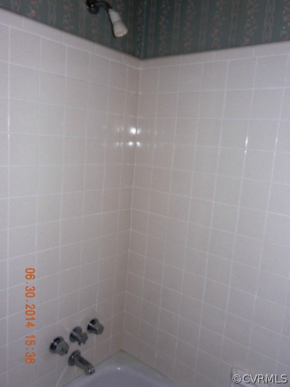 10940 Weybridge Road Chester, VA 23831 - Photo 13 of 16 a bathroom with a shower