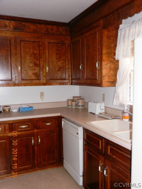 10940 Weybridge Road Chester, VA 23831 - Photo 2 of 16 a kitchen with a sink and cabinets