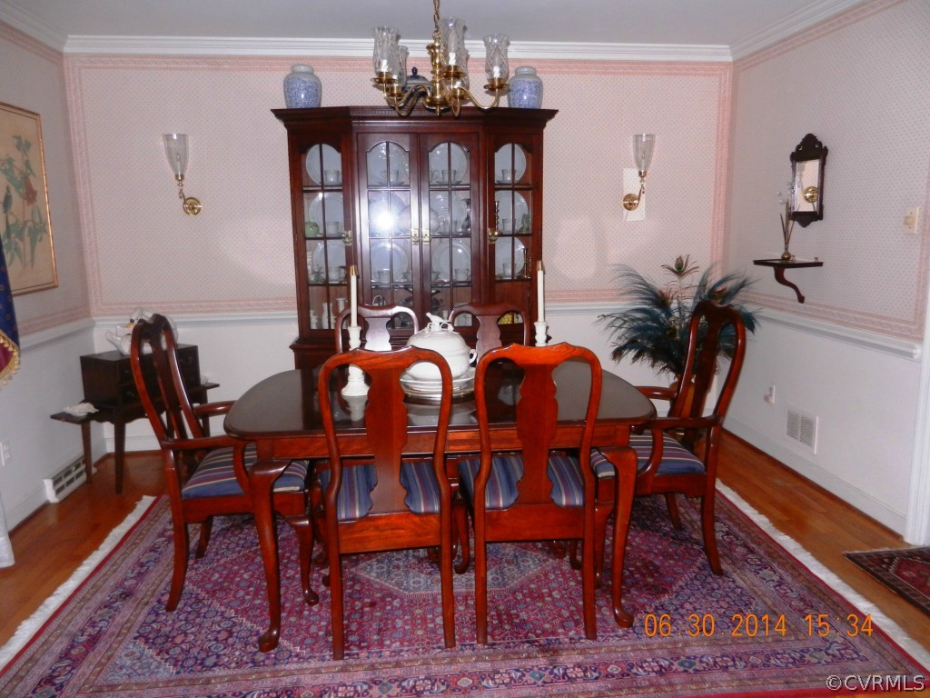10940 Weybridge Road Chester, VA 23831 - Photo 8 of 16 a dining room with furniture and window