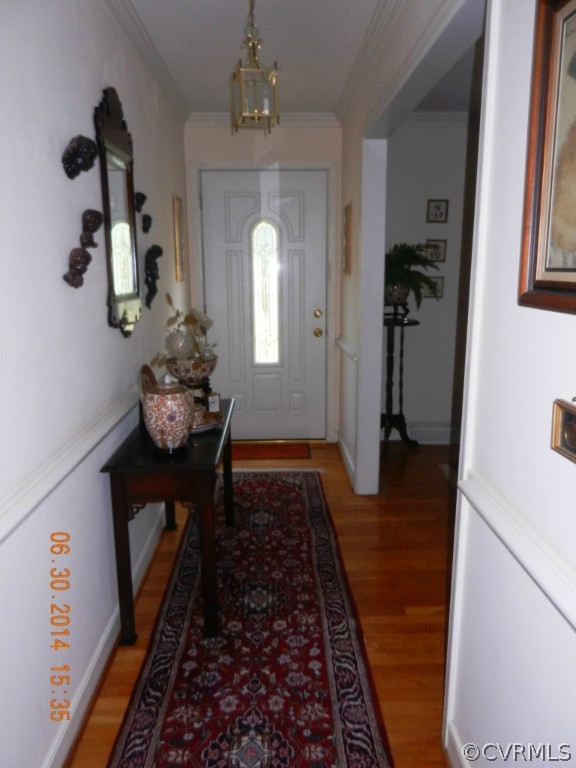 10940 Weybridge Road Chester, VA 23831 - Photo 9 of 16 a living room with furniture and a rug