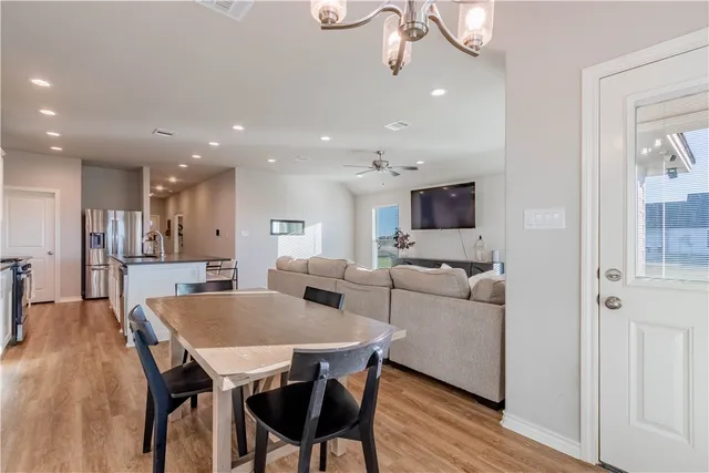 a living room with furniture and a table
