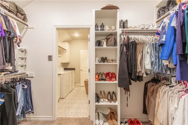 a kitchen with a refrigerator and a sink