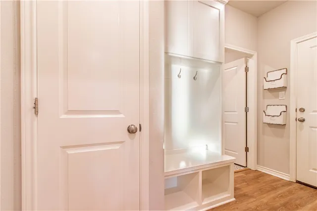 a kitchen with a refrigerator and a stove