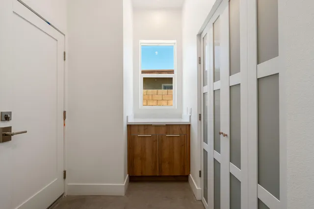 a view of an empty room with a window