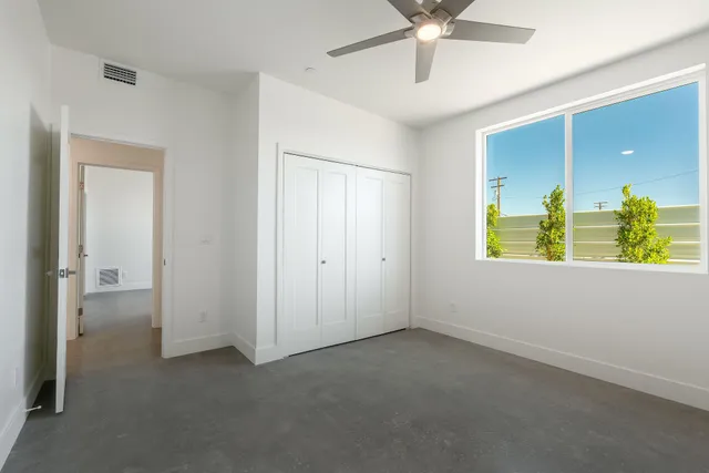 an empty room with a bathroom