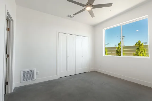 a bathroom with a shower and a toilet