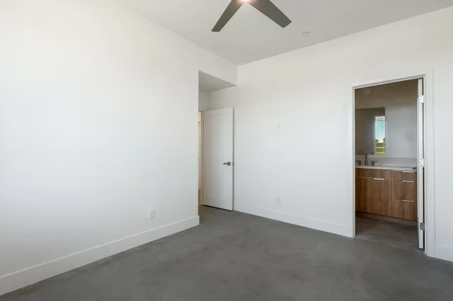 a view of a swimming pool with a lounge chairs