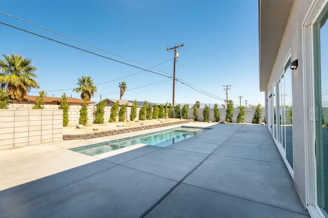 a view of an chairs and tables in the patio
