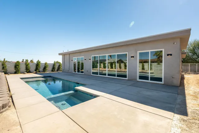 a swimming pool with mountain view