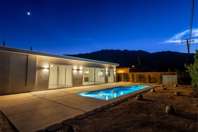 a view of a chairs and table in the terrace