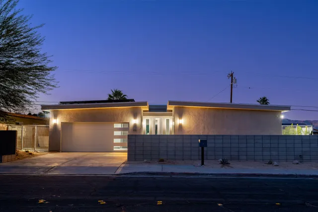 a view of a terrace with sitting area