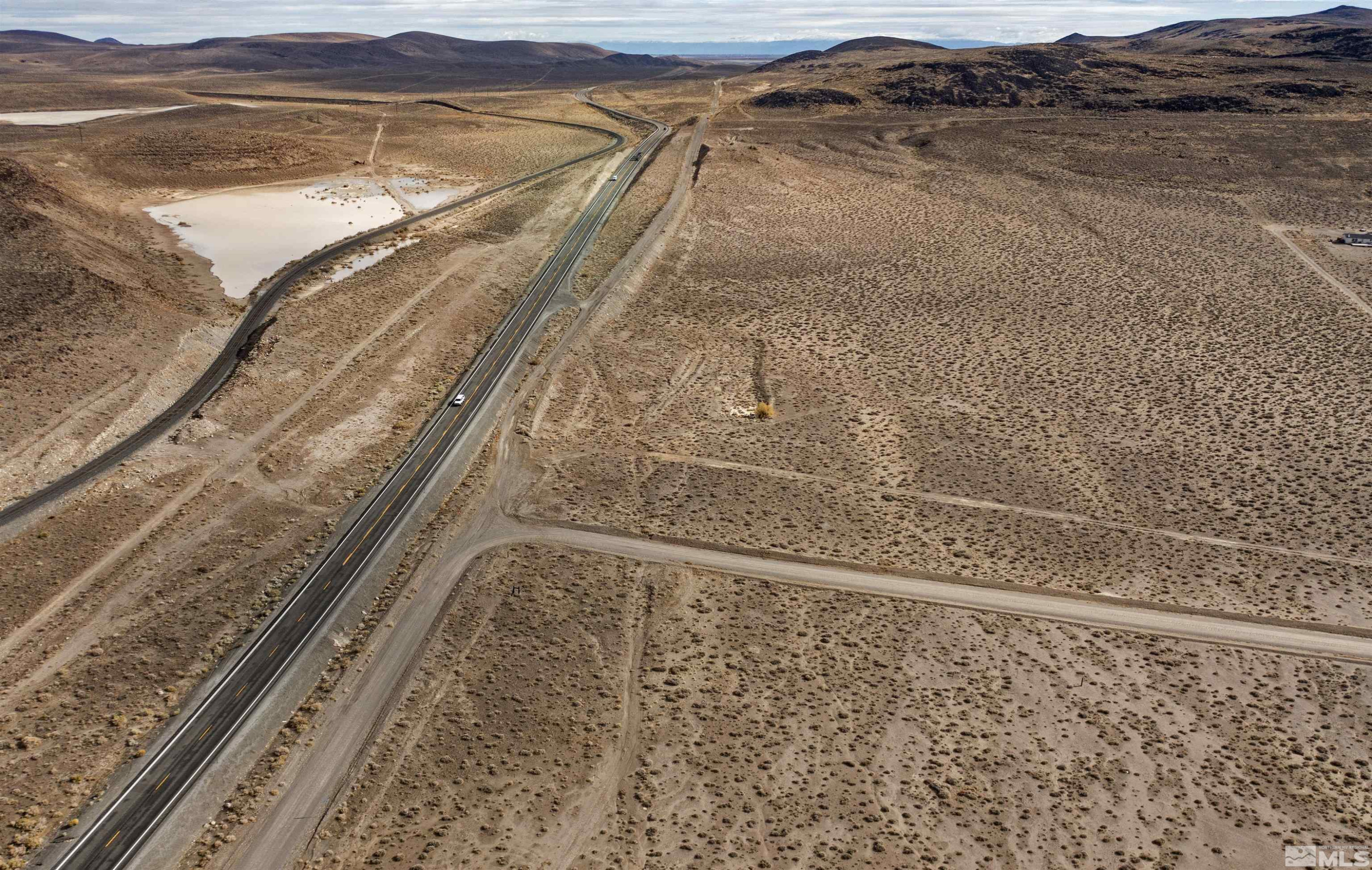 4025 Lincoln Road Silver Springs, NV 89429 - Photo 2 of 8 a view of a backyard of a house