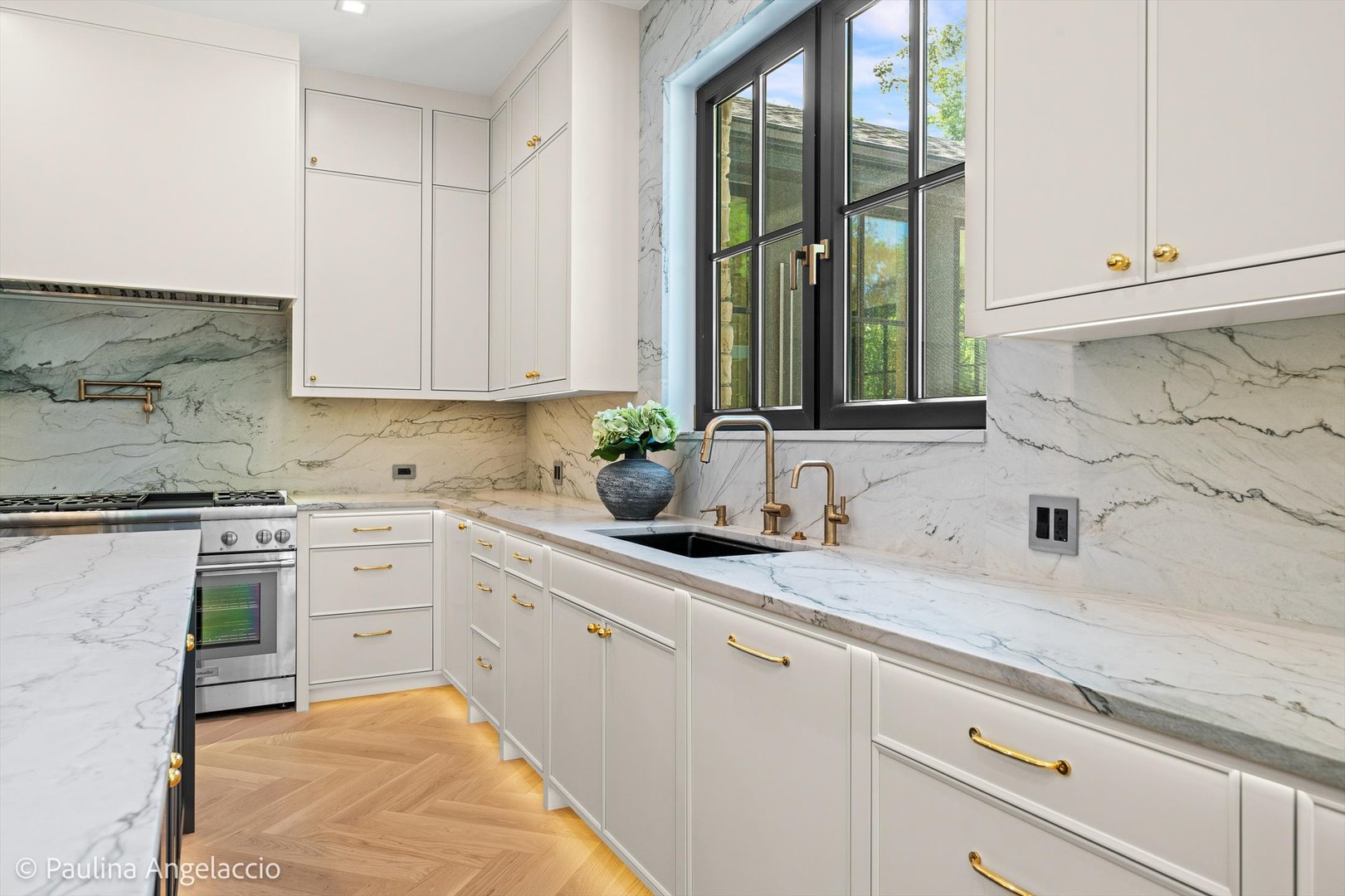 699 Plum Tree Road Barrington Hills, IL 60010 - Photo 24 of 84 a kitchen with granite countertop white cabinets and white stainless steel appliances